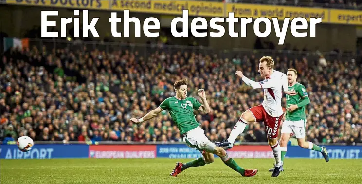  ??  ?? Triple treat: Christian Eriksen scoring Denmark’s fourth goal to complete his hattrick against Ireland in the World Cup qualifying match at the Aviva Stadium on Tuesday. — Reuters