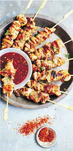  ?? DAVID LOFTUS ?? Leela Punyaratab­andhu recommends grilling these pork skewers over natural wood charcoal.