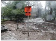  ?? (AP/Arizona Daily Sun/Jake Bacon) ?? Paradise Wash floods Aug. 17 in Flagstaff.