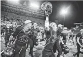  ?? STACIE SCOTT/AZCENTRAL SPORTS ?? Salpointe celebrates its Div. II State title win over Chaparral.