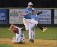  ?? AUSTIN HERTZOG - MEDIANEWS GROUP ?? Post 625 shortstop Tim Hornbuckle leaps over Boyertown’s Chris Davis after recording a force out at second base for the final out in a 5-3 win in the first round of the Pa. Region 2 tournament at Boyertown on July 19.