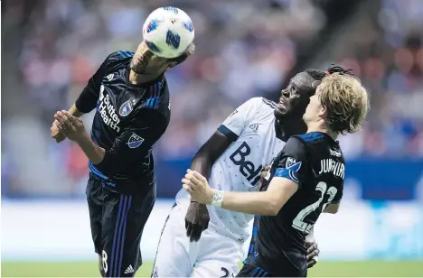  ?? DARRYL DYCK/THE CANADIAN PRESS ?? The Earthquake­s’ Chris Wondolowsk­i gets his head on the ball as the Whitecaps’ Kei Kamara and San Jose’s Florian Jungwirth watch during a match earlier this season. The Quakes are in town for a game Vancouver is determined to win to fuel its playoff push.