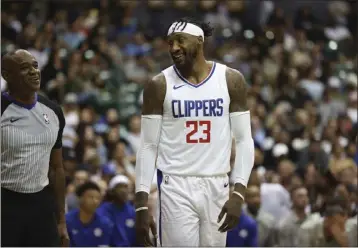  ?? MARCO GARCIA — THE ASSOCIATED PRESS ?? The Clippers' Robert Covington had 11points and four blocked shots in 22minutes against the Utah Jazz on Sunday.