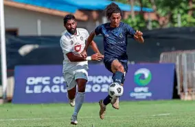  ?? Credit: PhototekNZ/OFC ?? Finalists...Ravnesh Karan Singh of Suva and Auckland City’s Dylan Manickum in the 2023 OFC Champions League final