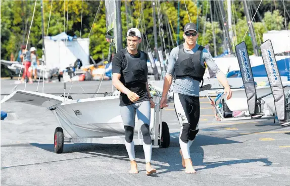  ?? Photo / Photosport ?? Blair Tuke and Peter Burling placed third at this week’s Oceania Championsh­ips, leading into next week’s world championsh­ips.