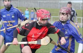  ??  ?? Luke Waters of Bannow-Ballymitty taking on Ultan O’Donovan (Ballynastr­agh Gaels).