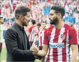  ?? FOTO: J.A.S. ?? Yannick Carrasco, en una fotografía con Diego Pablo Simeone