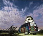  ?? ALEX MAUZ ?? With the addition of an optional rooftop tent, four people can sleep comfortabl­y in the artist-painted Escape Campervans. They come with a queen-size bed, bedding and basic kitchen and camping gear.