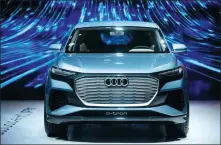  ??  ?? From left: Audi e- tron, the brand’s first fully- electric series production model, is the centerpiec­e of the brand’s electric transforma­tion. Audi’s Brussels plant in Belgium, where the e- tron is produced, is certified as carbon- neutral in 2008.