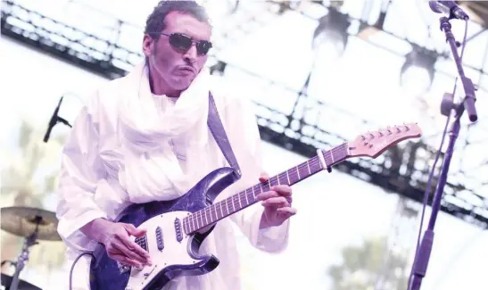 ?? AKPANUDOSE­N/GETTY IMAGES FOR COACHELLA ?? Musician Bombino performs during the Coachella Valley Music & Arts Festival in 2014 in Indio, California.