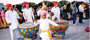  ?? Reuters ?? ↑
A traditiona­l dancer performs as Donald Trump leaves the Agra airbase.