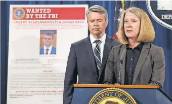  ?? SUSAN WALSH, AP ?? Acting Assistant Attorney General Mary McCord, accompanie­d by U. S. Attorney for the Northern District Brian Stretch, speak about the security breach at Yahoo.