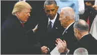  ?? MARK RALSTON / AFP VIA GETTY IMAGES FILES ?? U.S. President Donald Trump shakes hands with Barack Obama and Joe Biden after being sworn in 2017. It's unclear if Trump will attend Biden's inaugurati­on.