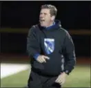  ?? JOHN BLAINE — FOR THE TRENTONIAN ?? West Windsor North coach Trevor Warner shouts instructio­ns to his team during a Central Group IV quarterfin­al game against New Brunswick. Warner was named the Myernick Coach of the Year by his peers on Wednesday night.