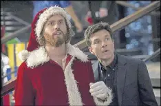  ?? GLEN WILSON/DREAMWORKS PICTURES ?? T.J. Miller stars as Clay Vanstone and Jason Bateman as Josh Parker in the film “Office Christmas Party.”