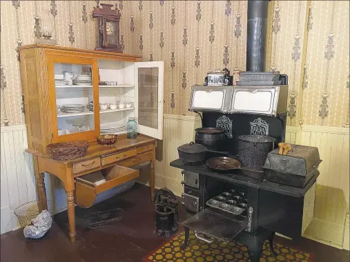  ??  ?? “The standard Victorian kitchen would have had a coal- or wood-burning stove for cooking and baking, no indoor running water and an icebox to keep foods cold,” says Serena Barnett, director of the Rogers Historical Museum, explaining the kitchen in the 1895 Hawkins House.
(Courtesy Photo/RHM)