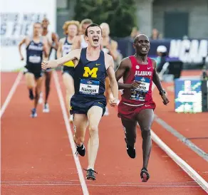  ?? — THE ASSOCIATED PRESS ?? Michigan’s Ben Flanagan of Kichener, Ont. celebrates his NCAA title in the men’s 10,000 metres Wednesday at Hayward Field in Eugene, Ore. It was the final race of his collegiate career.