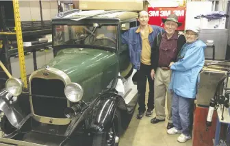  ?? ?? Dave Jones and his father Fred with the 1928 Ford Model A after the first restoratio­n.