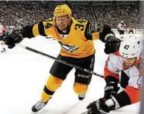  ??  ?? Der deutsche Eishockey-Nationalsp­ieler Tom Kühnhackl von den Pittsburgh Penguin. Foto: Gene Puskar