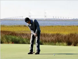  ?? STREETER LECKA/GETTY IMAGES ?? Charles Howell III putts on the 14th green Friday during the second round of the RSM Classic at Sea Island Golf Club on St. Simons Island.