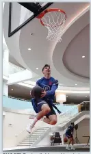  ??  ?? SHOOT! England’s Mason Mount shows off his skills at basketball yesterday