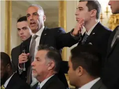  ??  ?? Andrew Pollack, whose daughter Meadow was killed in the Parkland shooting, is joined by his sons as he addresses a listening session with Donald Trump in the White House (Getty)