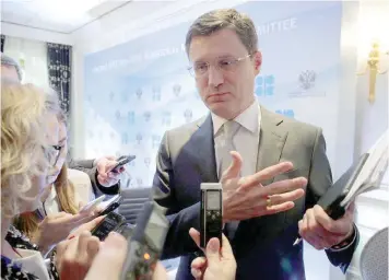  ??  ?? Russian Energy Minister Alexander Novak speaks to journalist­s after a news conference of the Opec and Non-opec Ministeria­l Monitoring Committee in St Petersburg, in this file photo. — Reuters