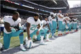  ?? STEPHEN BRASHEAR— ASSOCIATED PRESS ?? Miami Dolphins players who protest on the field during the national anthem this season could be suspended for up to four games under a new team policy issued to players this week.