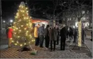  ?? GENE WALSH — DIGITAL FIRST MEDIA ?? Chestmont Jubilaires sing for guests during the Hometown Holiday celebratio­n at Smith Family Plaza in Pottstown last December.