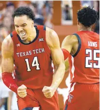  ?? ERIC GAY/AP ?? Texas Tech forward Marcus Santos-Silva celebrates after a basket against Texas during Saturday’s game in Austin, Texas.