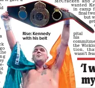  ??  ?? Rise: Kennedy with his belt