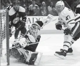  ?? PAUL VERNON, THE ASSOCIATED PRESS ?? Columbus goalie Joonas Korpisalo stops a shot against Maple Leafs forward Leo Komarov as Blue Jackets defenceman Seth Jones defends during the first period in Columbus, Ohio, Wednesday.