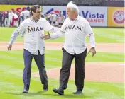  ?? MATIAS J. OCNER mocner@miamiheral­d.com ?? City of Miami Mayor Francis X. Suarez and Carlos A. Gimenez, then Miami-Dade County’s mayor, after throwing out an opening pitch at Marlins Park in 2018.