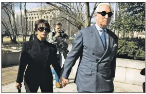  ?? AP/JOSE LUIS MAGANA ?? Roger Stone arrives for his federal court appearance Thursday in Washington with his wife, Nydia.