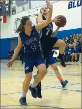  ?? NEWS PHOTO SEAN ROONEY ?? Eagle Butte's Amer Karamanos (7) puts up a shot as Crescent Heights' Kia Kannekens (4) defends during a 3A girls South Zone basketball quarter-final Thursday at Crescent Heights.