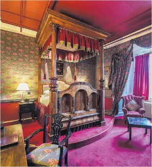  ??  ?? OPULENT The massive four-poster bed dominates the stunning bedroom at Lumley