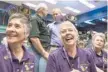  ?? — AFP ?? Sandra Martin (L), Carol WebsterCla­phan (C) and Mary Knoll, friends and family of Cassini team members, celebrate the Cassini mission at the end of mission final press conference, at Nasa’s Jet Propulsion Laboratory in Pasadena, California.