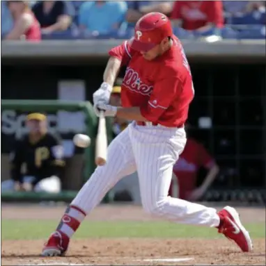  ?? LYNNE SLADKY — THE ASSOCIATED PRESS ?? Phillies’ Adam Haseley hits an RBI single during a spring training game.