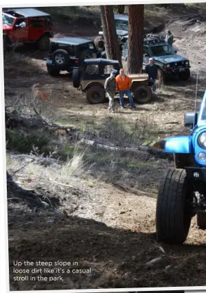  ??  ?? Up the steep slope in loose dirt like it’s a casual stroll in the park