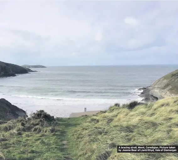  ??  ?? A bracing stroll, Mwnt, Ceredigion. Picture taken by Jeanne Bear of Llantrithy­d, Vale of Glamorgan