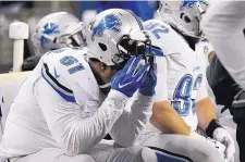  ?? STEPHEN BRASHEAR/ASSOCIATED PRESS ?? Lions defensive end Kerry Hyder slumps on the bench during Saturday’s playoff game against Seattle.