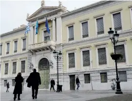  ??  ?? the National Bank of Greece headquarte­rs in central Athens on Sunday. Greece has failed to find a boss for its Hellenic Financial Stability Fund since its threemembe­r executive team resigned in July.