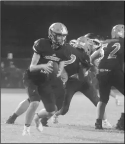  ?? Photo by Gerren Smith ?? STEPPING UP IN KEY ROLES: Sophomore Jacob Clausen (3) looks for a target to pass while playing quarterbac­k for Magnet Cove during week 4 against Dierks. Clausen stepped in at the quarterbac­k position for the Panthers against Dierks for his experience to fulfill an important role while Magnet Cove have had several key players out during the non-conference schedule.