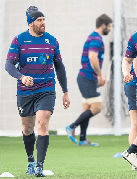  ??  ?? STANDING STRONG: Jonny Gray trains with his Scotland team-mates at the Oriam ahead of today’s big kick off