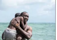  ?? Democrat-Gazette file photo ?? Alex Hibbert (left) and Mahershala Ali star in Moonlight, which was (eventually) named best picture at the 2017 Academy Awards.