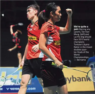  ??  ?? We’re quite a pair: Barring any upsets, Tan Kian Meng (left) and Lai Pei Jing should face 2013 world champions Tontowi-Lilyana Natsir in the mixed doubles quarter-finals of the World Championsh­ips. — Bernama