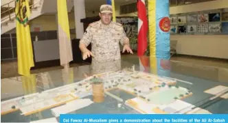  ??  ?? Col Fawaz Al-Musailem gives a demonstrat­ion about the facilities of the Ali Al-Sabah Military College.