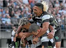  ?? GETTY IMAGES ?? Hawkes Bay’s players celebrate a try during their championsh­ip final match against Northland at McLean Park in Napier last night.