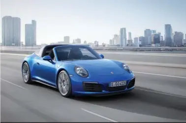  ?? (Porsche) ?? Porsche has added performanc­e features from its 911 GT3 and 911 Turbo cars to the new 911 Targa 4S, making a fine car all the finer.