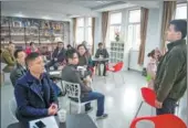  ?? XINHUA ?? A teacher lectures on startup enterprene­urship at a businesssc­hool class in Hefei, capital of Anhui province.